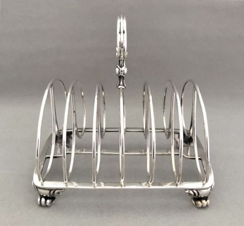 fig 1. An outstanding large Victorian silver toast rack by Garrards