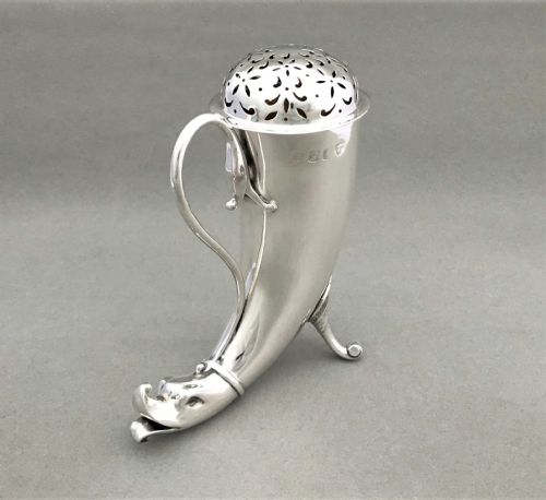 An Outstanding Irish Silver 'Cornucopia' Silver Sugar Caster