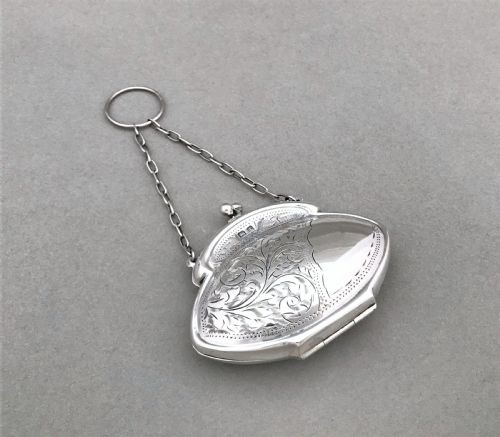 fig 1. A lovely acanthus engraved silver cocktail purse
