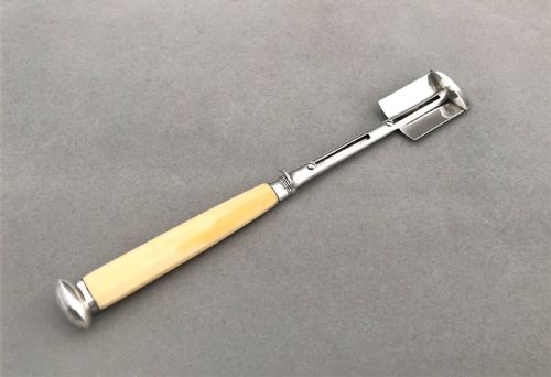 A Wonderful Georgian Silver Stilton Scoop with 'Push Release' Mechanism