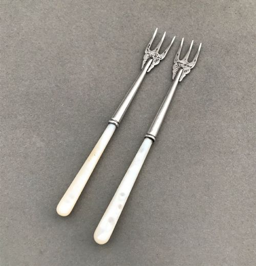 A Charming Pair of Victorian Chester Silver Pickle Forks