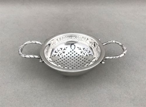 An Attractive Silver Tea Strainer