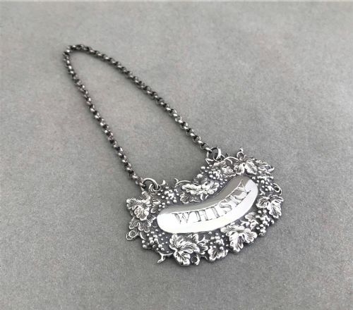 A Lovely Early Victorian Silver Whisky Label