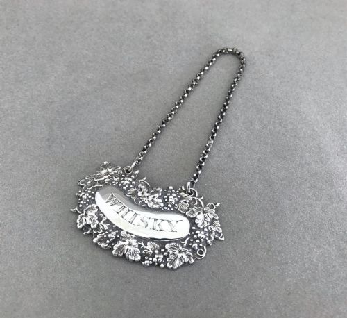 fig 1. A lovely early Victorian silver Whisky label