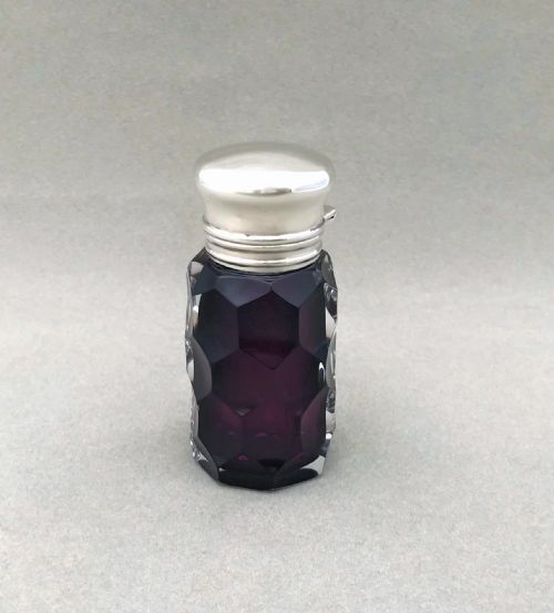 fig 1. An exquisite Edwardian silver and amethyst glass scent bottle