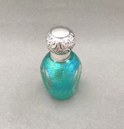 fig 1. A superb Edwardian silver mounted iridescent scent bottle