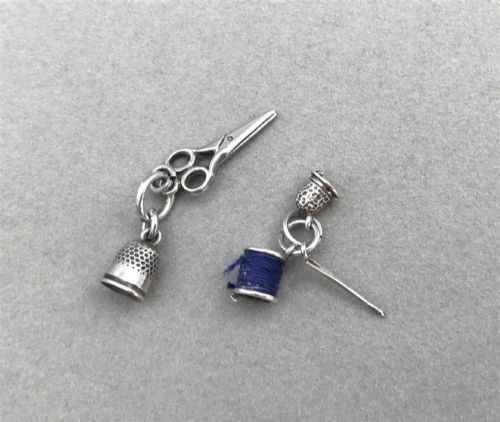 A Gorgeous Pair of Sewing Interest Silver Charms