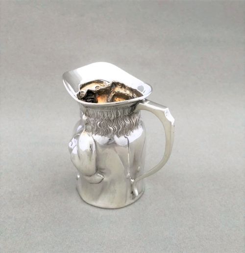 fig 1. An extremely rare novelty silver Toby cream jug