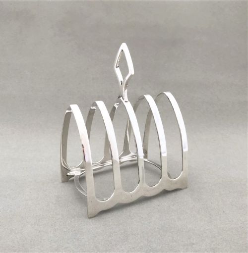 fig 1. An attractive four slice silver toast rack