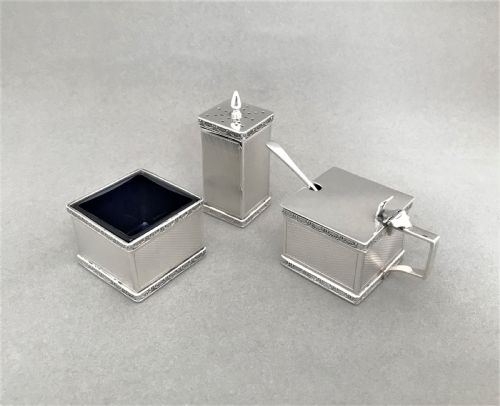 A Stylish Art Deco Silver Three Piece Cruet