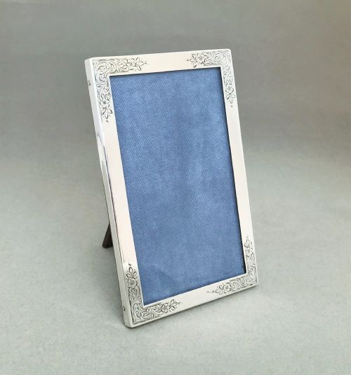 A Gorgeous Engraved Silver Photo Frame