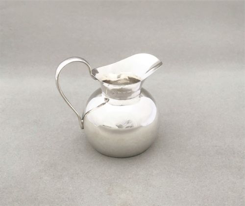 fig 1. A stylish small Edwardian silver cream jug