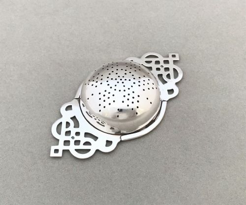 fig 1. A gorgeous Art Deco silver tea strainer