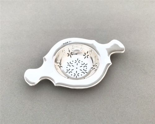 A Gorgeous Twin Handled Silver Tea Strainer