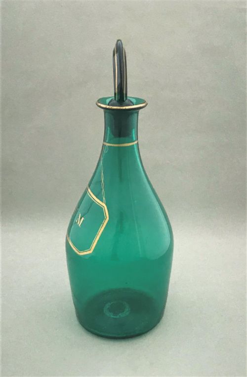 fig 1. A splendid Bristol Green gilded Rum decanter