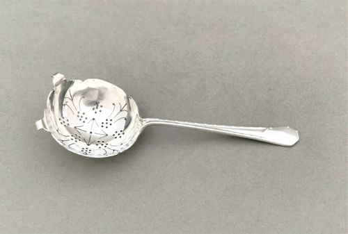 An Art Deco Period Silver Tea Strainer
