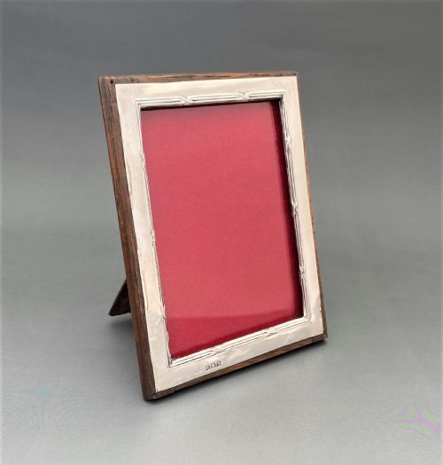 fig 1. A George V silver & oak easel back photo frame