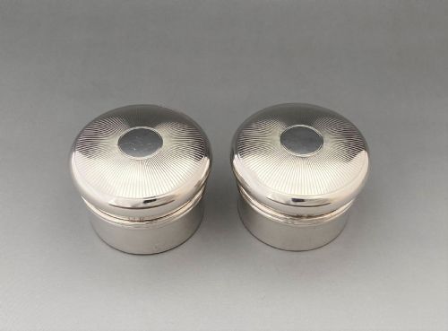 fig 1. A rare pair of his 'n' hers silver gilt pill boxes