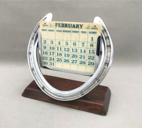 fig 1. An Edwardian lucky Horse Shoe Plated Perpetual Calendar