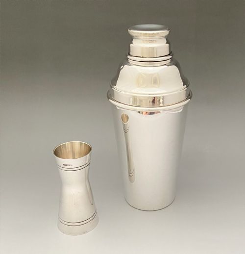 An Art Deco Silver Plated Cocktail Shaker & Measure