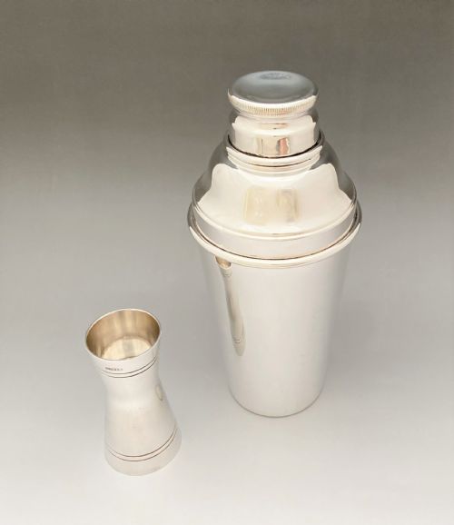fig 1. An Art Deco silver plated cocktail shaker & measure