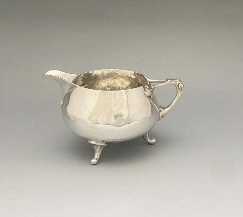 A Fabulous Arts & Crafts Small Silver Cream Jug
