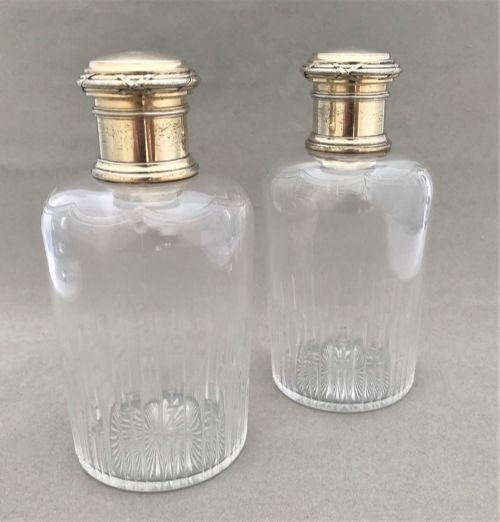 A Gorgeous Pair of Parisian Silver Gilt Cologne Bottles