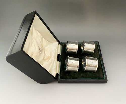 fig 1. A handsome set of four boxed Chester silver napkin rings