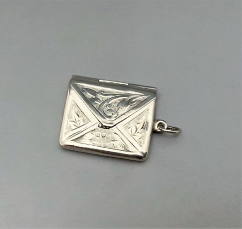 A Chester Silver Stamp Envelope with Heart Cartouche
