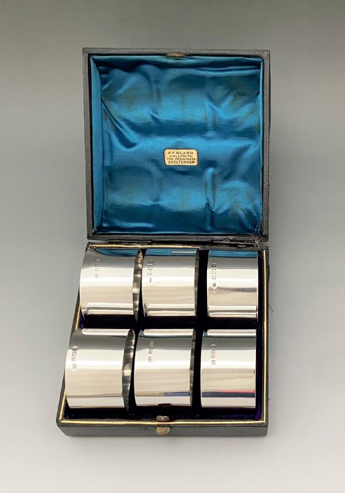 fig 1. A rare set of 6 boxed Edwardian silver napkin rings