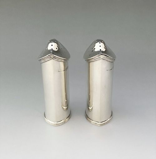 fig 1. A stylish pair of Asprey & Co. Chester silver pepper pots