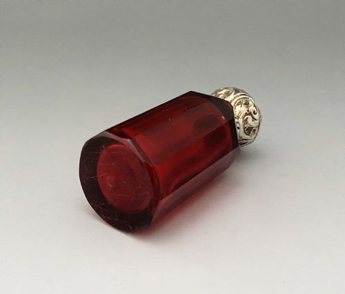 fig 1. A Victorian silver mounted Ruby glass scent bottle