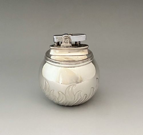 A Stylish Silver 'Witch Ball' Table Lighter by Comyns