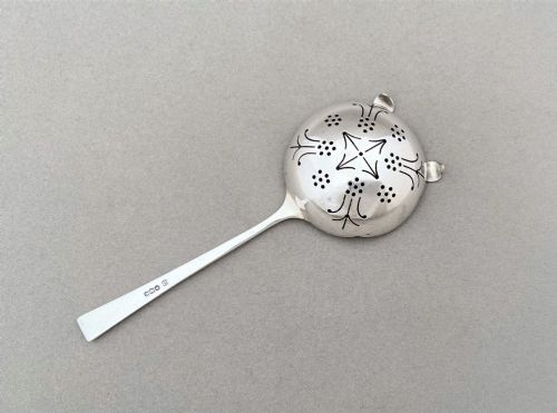 fig 1. A Fine Silver Tea Strainer In The Art Deco Taste