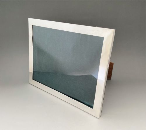 A Large Silver Landscape/portrait Photo Frame