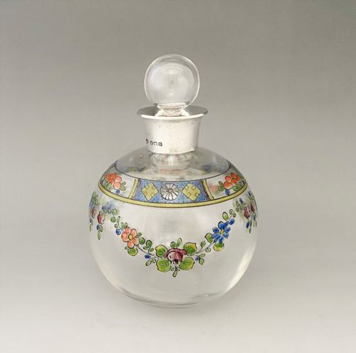 A Lovely Silver Mounted Globe Cologne Bottle