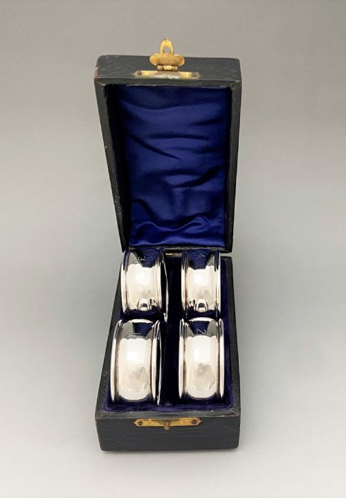 An Edwardian Boxed Set of Four Silver Napkin Rings