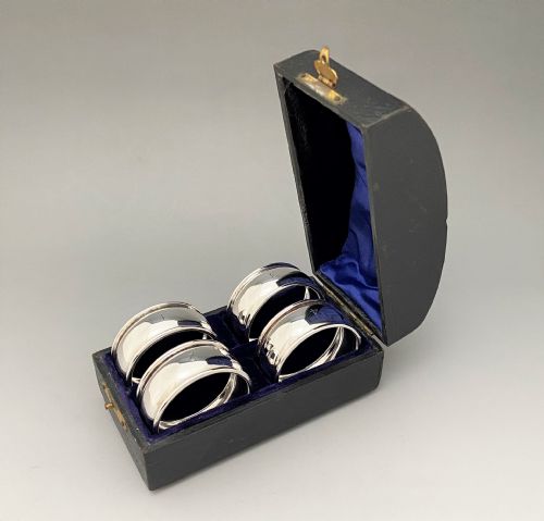 fig 1. An Edwardian boxed set of four silver napkin rings