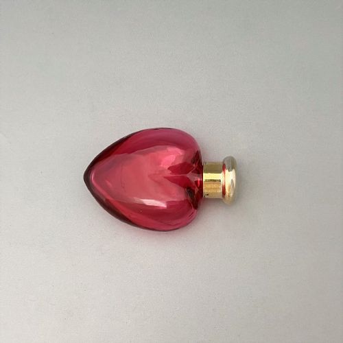 fig 1. A Victorian Sampson Morden silver mounted heart scent bottle