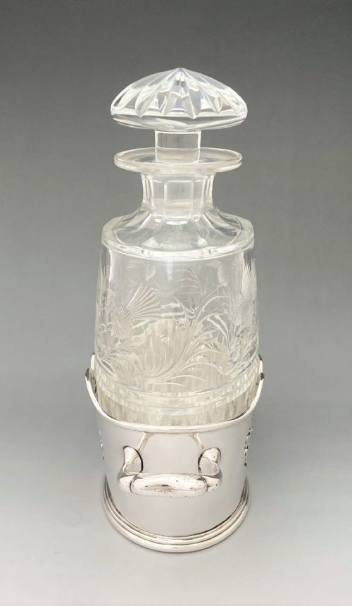 fig 1. A fabulous cut glass decanter with silver plated holder