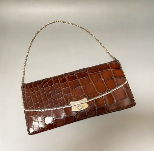 A Fabulous Silver Mounted Crocodile Evening Bag & Purse
