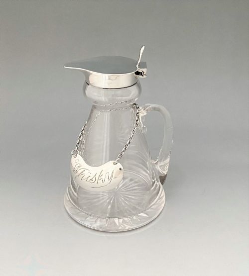 A Fine Silver Mounted Whisky Tot with Original Matching Silver Label