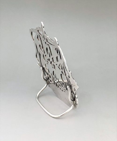 fig 1. A superb cast silver 'SS Golconda' menu holder