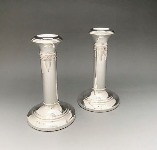 An Elegant Pair of Edwardian Silver Candlesticks