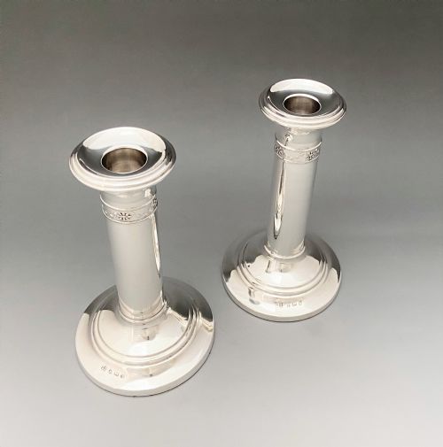 fig 1. An elegant pair of Edwardian silver candlesticks