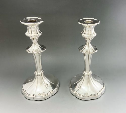 A Fabulous Pair of Full Height Silver Candlesticks