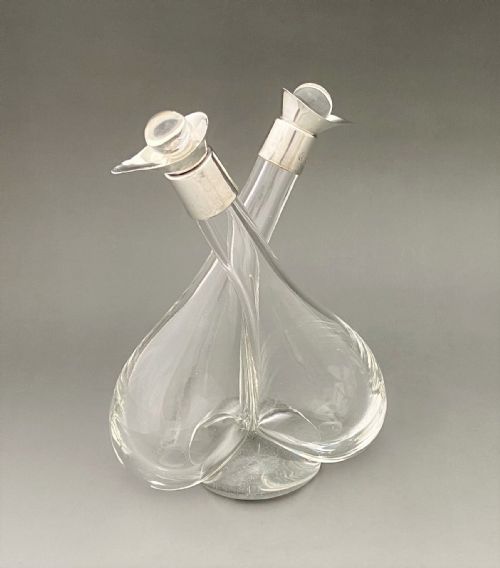 fig 1. A George V silver mounted oil & vinegar duo