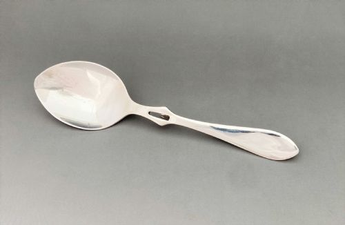 A Desirable Silver Honey Spoon
