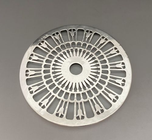 fig 1. A lovely silver mounted teapot stand/coaster