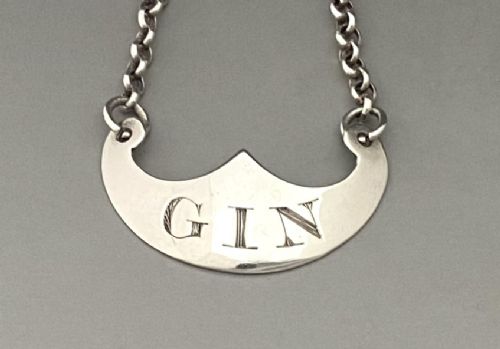 fig 1. An excellent Scottish silver Gin label